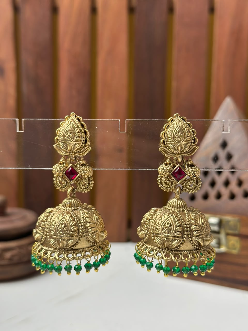 Designer Gold-Plated Temple Jhumki Earrings with Green Bead Drops
