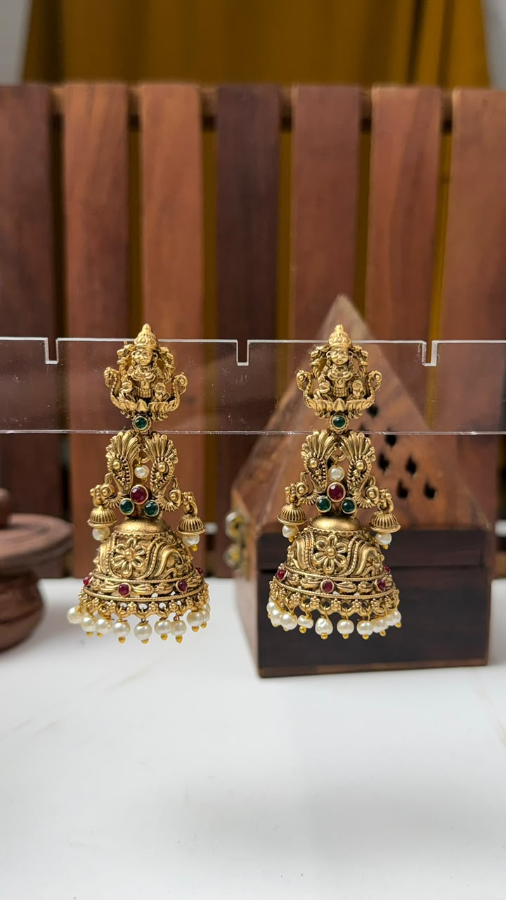 Matte-Finish Goddess Lakshmi Temple Jhumka Earrings with White Beads